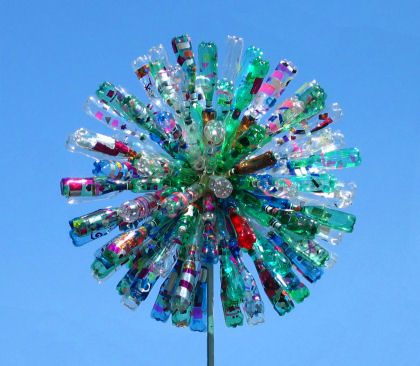 dandelion sculpture turns in the wind 
